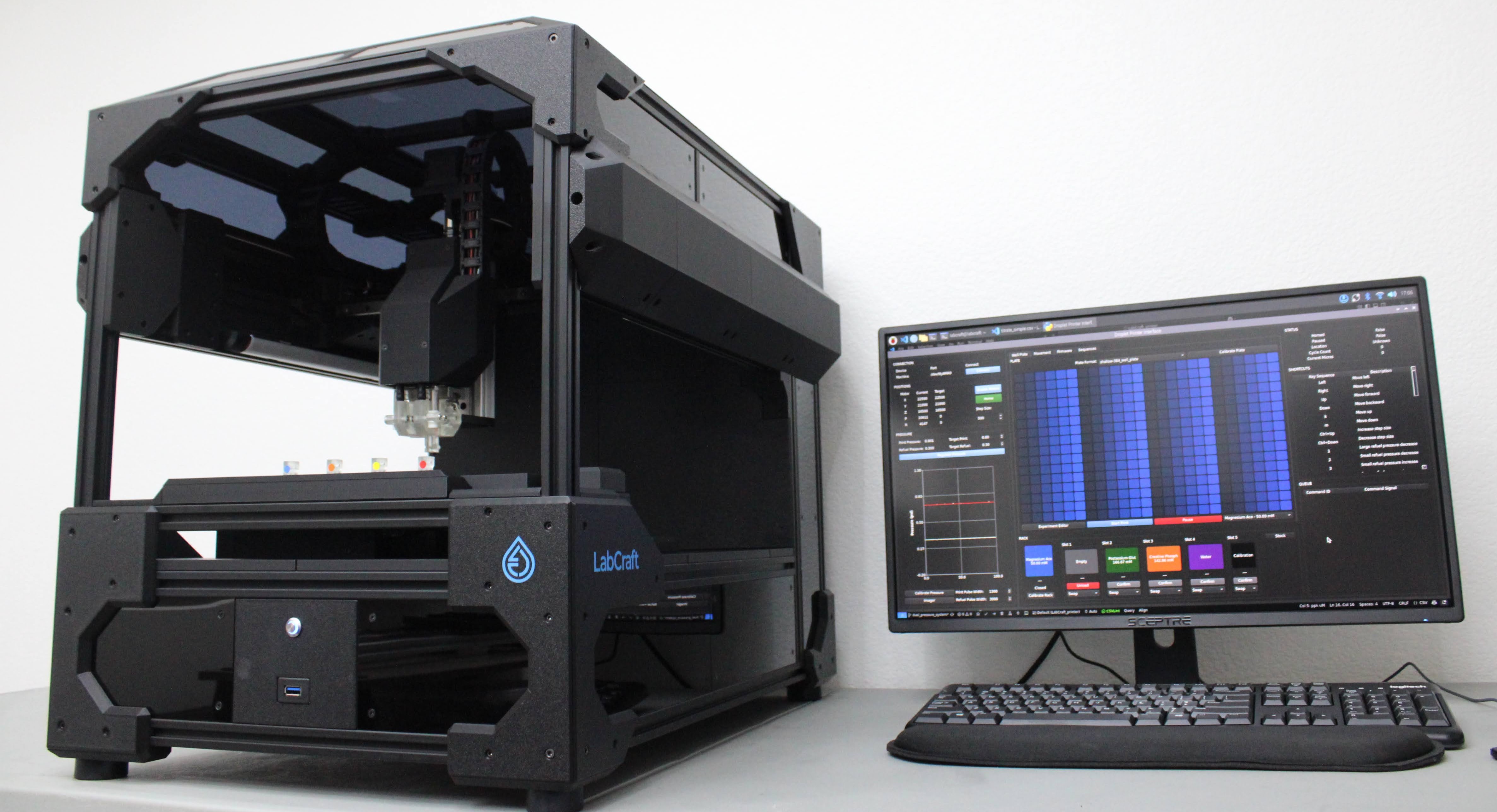 LabCraft Plex droplet printer with monitor showing the user interface
